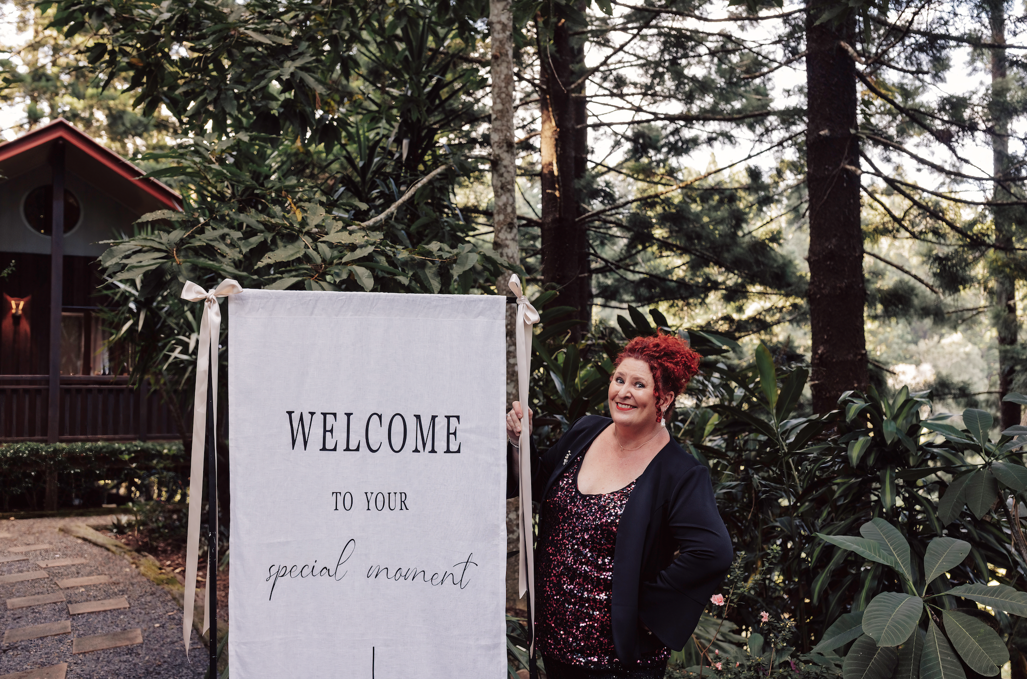 Kate Ellis, Brisbane celebrant, welcoming baby naming services in a garden — approachable, professional and genuine