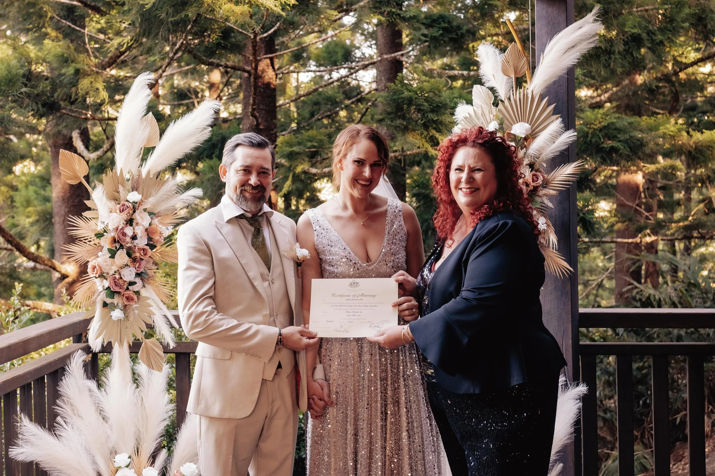 It&rsquo;s official ✨

This is my favourite moment of every single ceremony, the second the certificate is signed and I get to hand it over. Because that piece of paper means something. It means done. Legal. Real. Married.

The smiles in this photo s