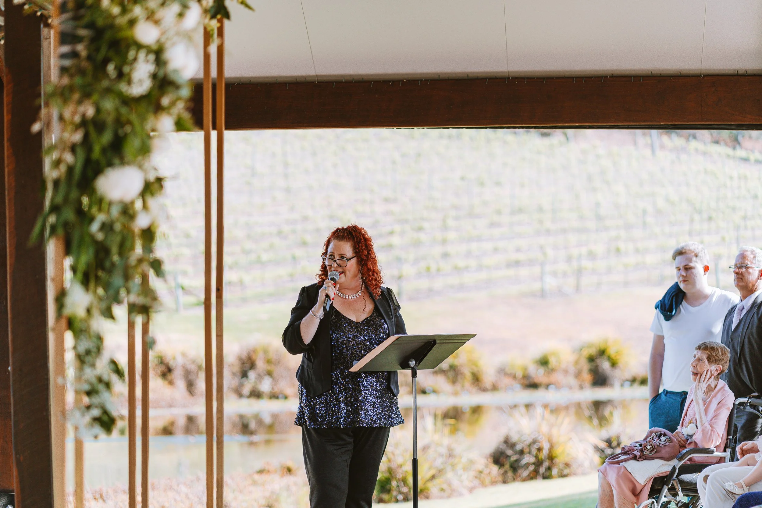 Kate Ellis, Brisbane celebrant, performing an MC service in a venue — approachable, professional and genuine