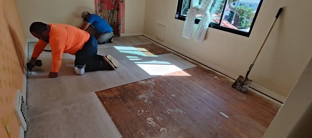 Spanish style home renovation. Removed carpet. Installed imported mexican saltillo tiles
