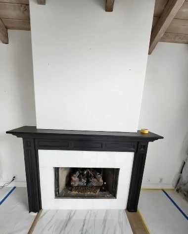 Commercial fireplace remodel. Modern gas. Black. Iron
