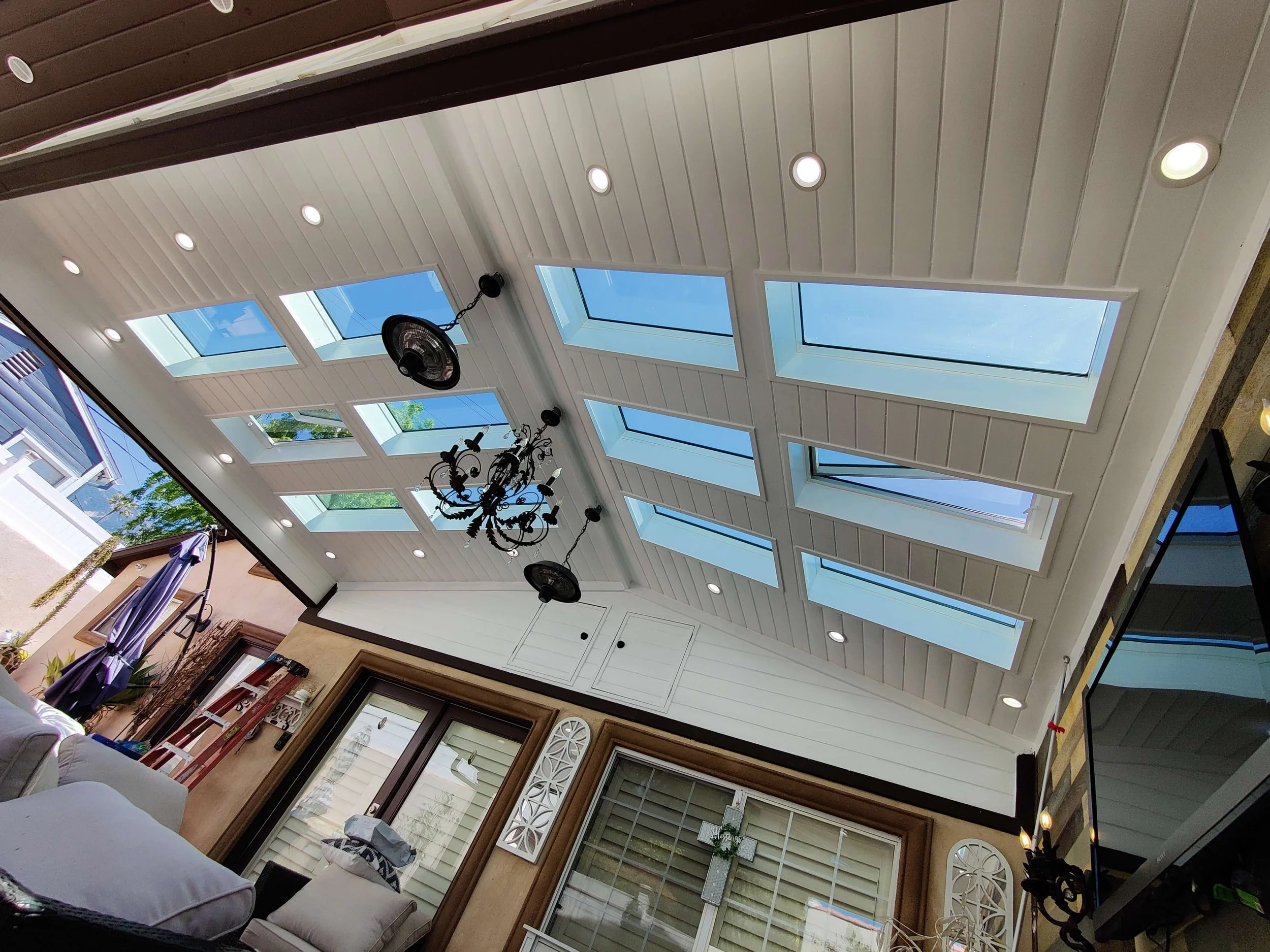 Outdoor patio remodel skylights lounging area