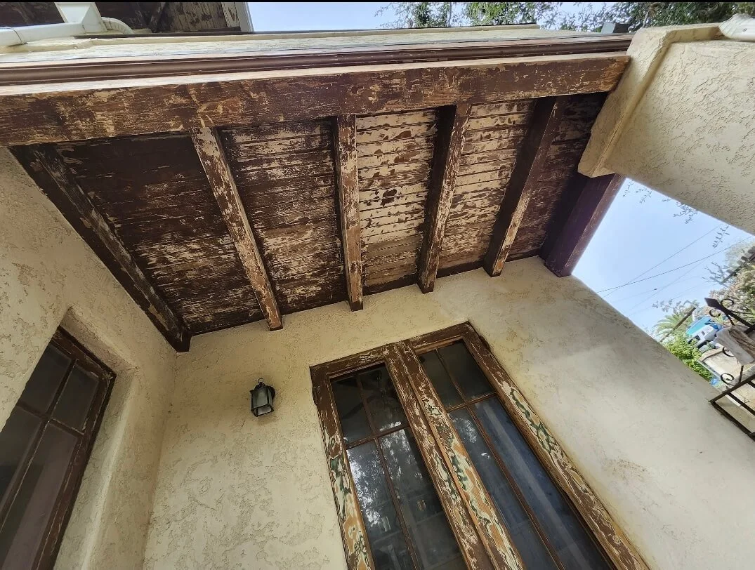 Repairing exterior wood. Water damage. rafters