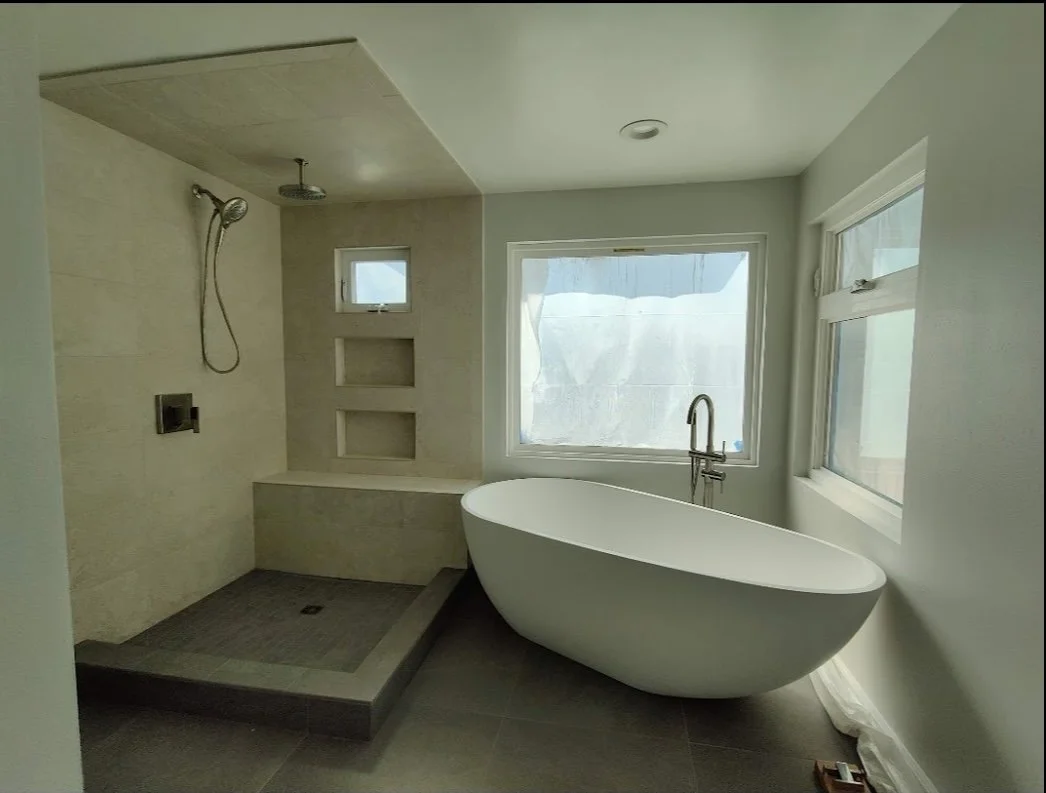 Luxury bathroom upgrade remodel renovation with large stand alone tub and open shower