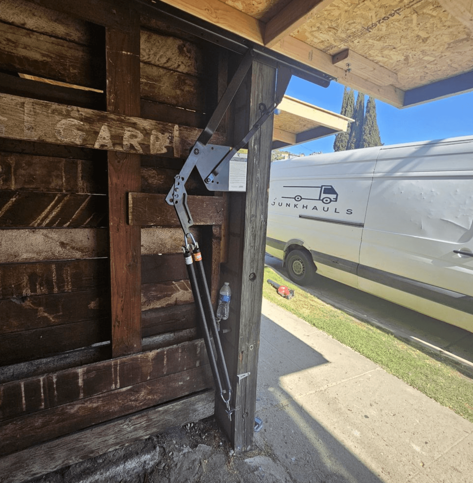 Replaced and installed new garage arms, springs, and motor