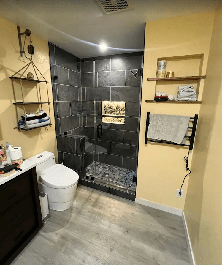 river stone shower floor install