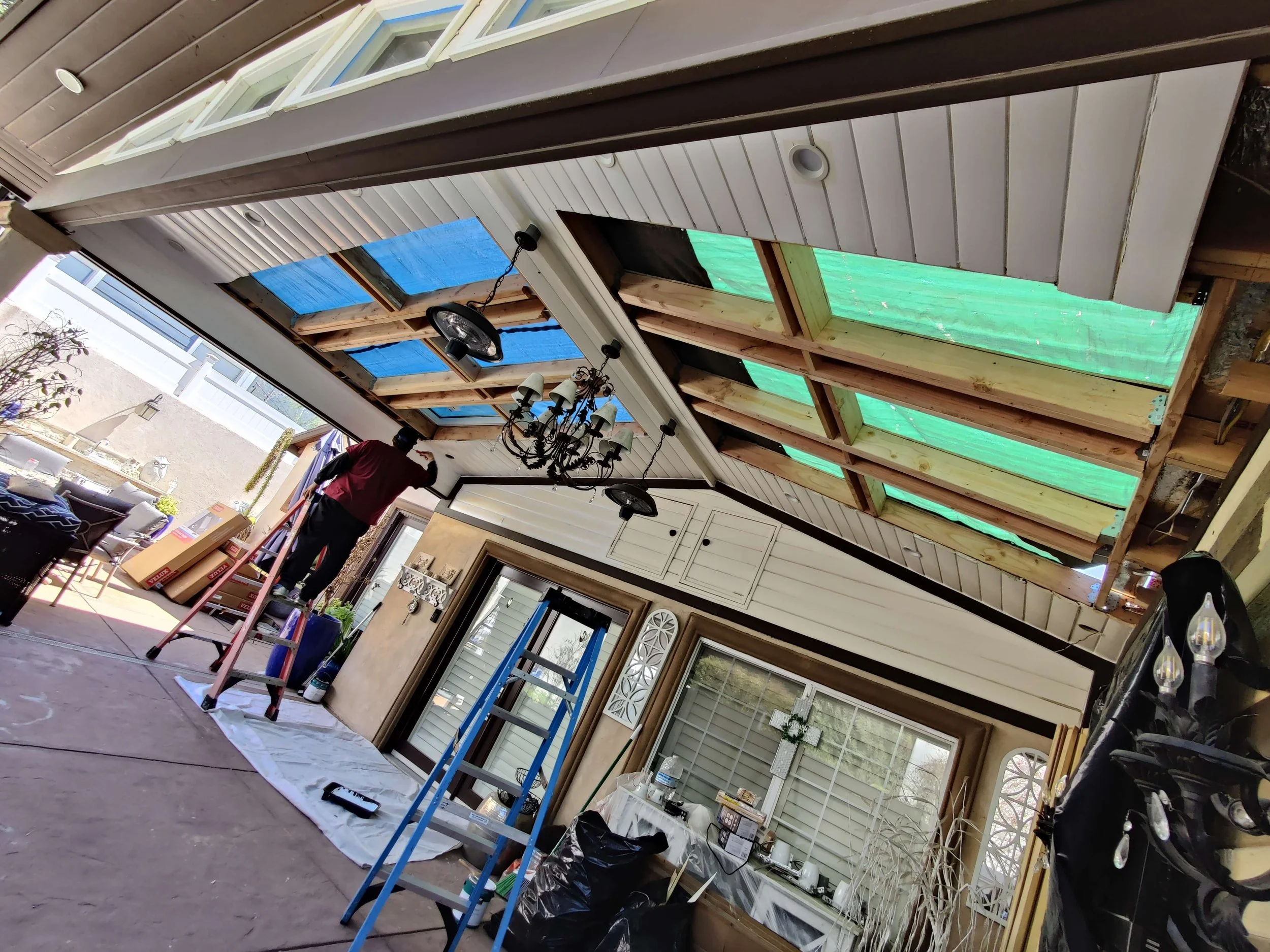 Replacing skylight windows for outdoor patio living space