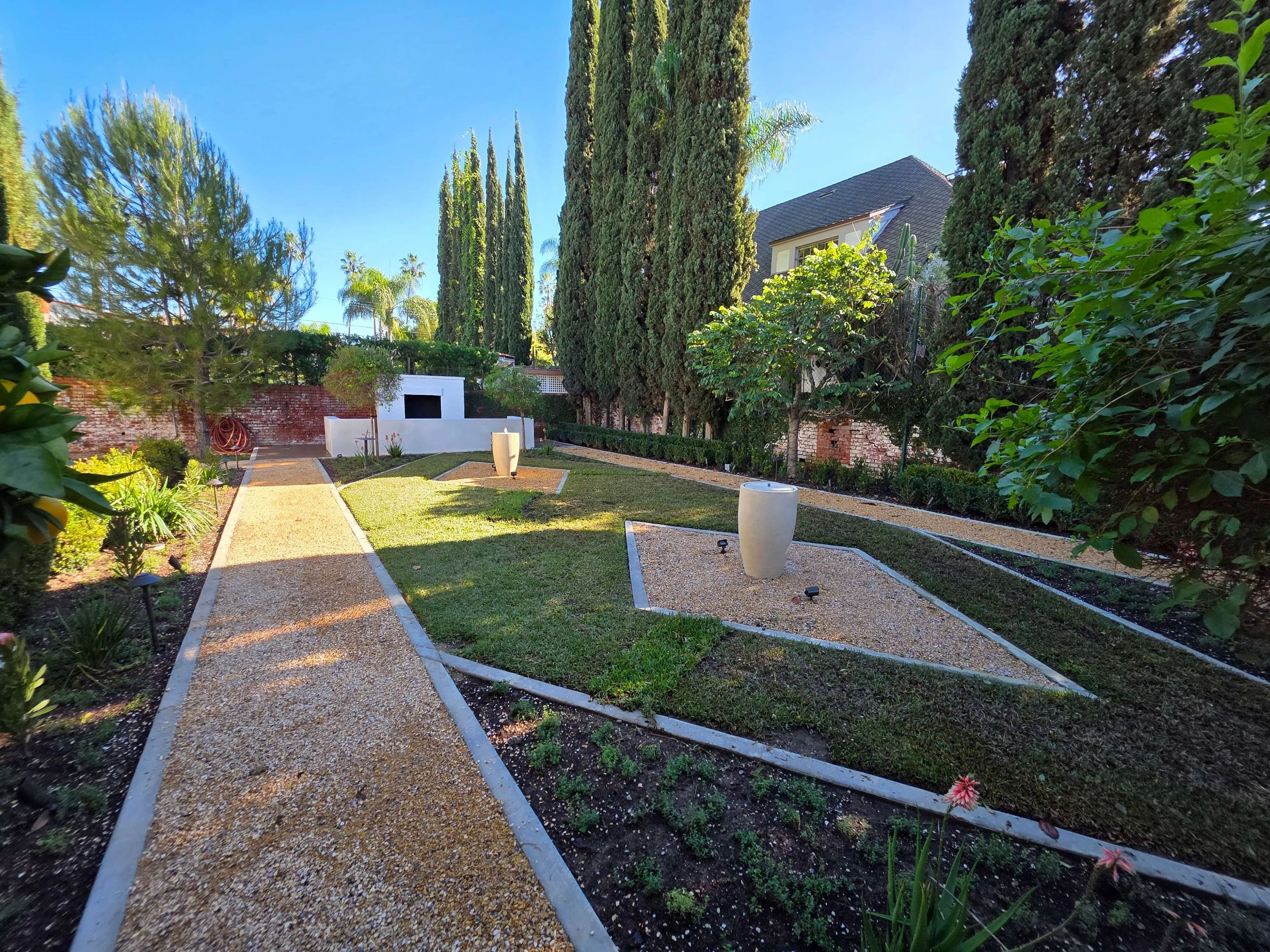 Full few of exterior landscaping and work including groundwork and outdoor fireplace