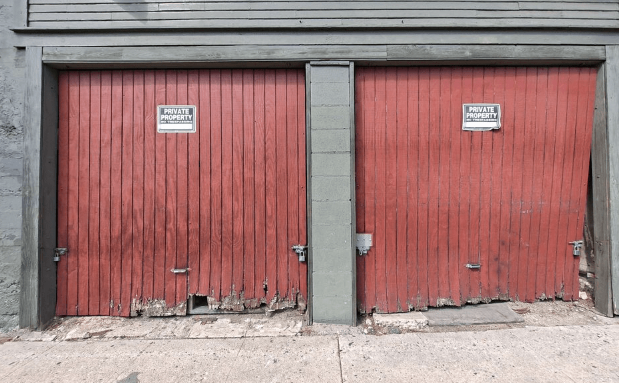 Custom garage repair. Before rotted wood.