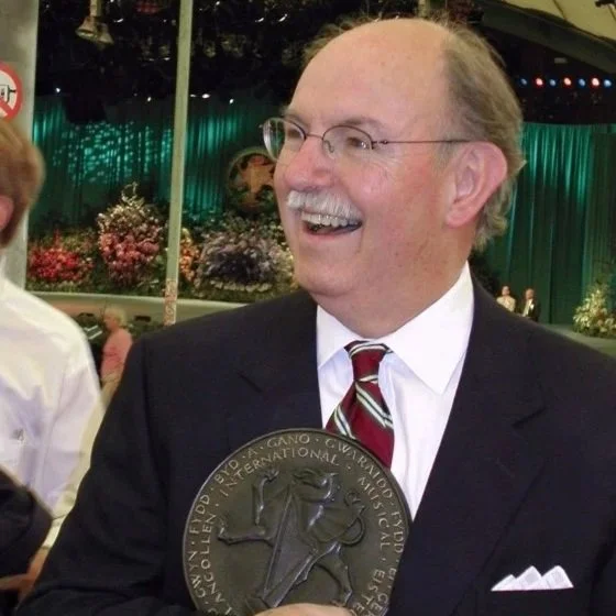 Mastersingers Bruce McInnes poses with trophy