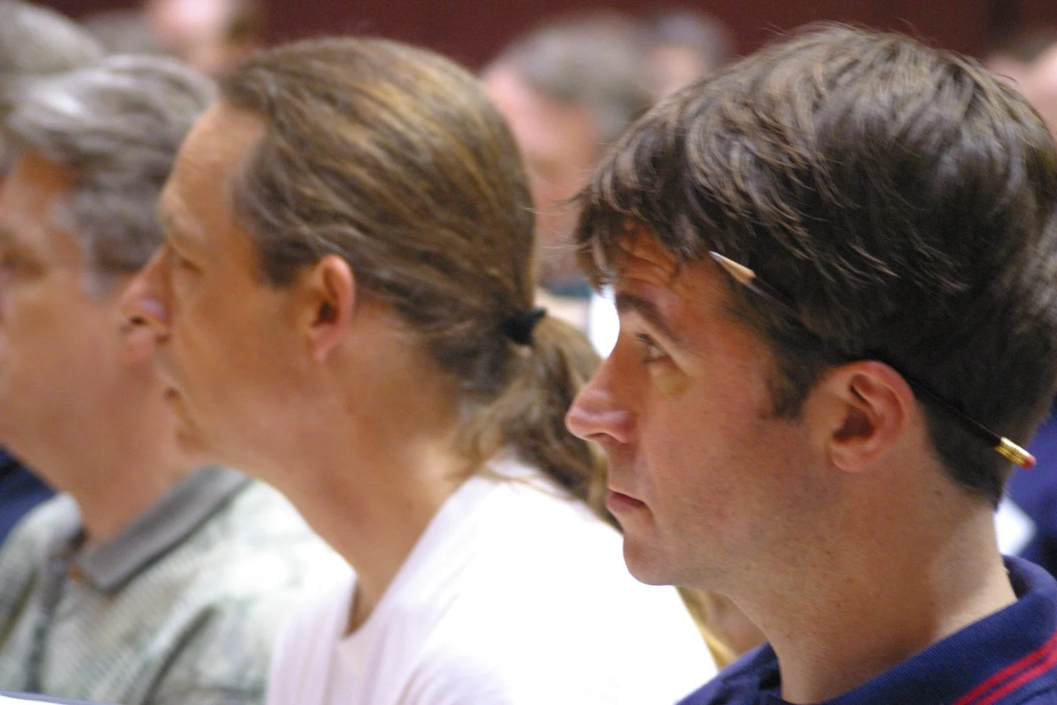 First tenors listening to the conductor.