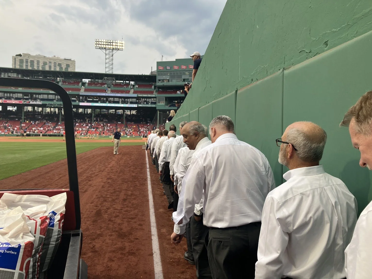 Mastersinges preparing to sing the National Anthem at Fenway Park. 