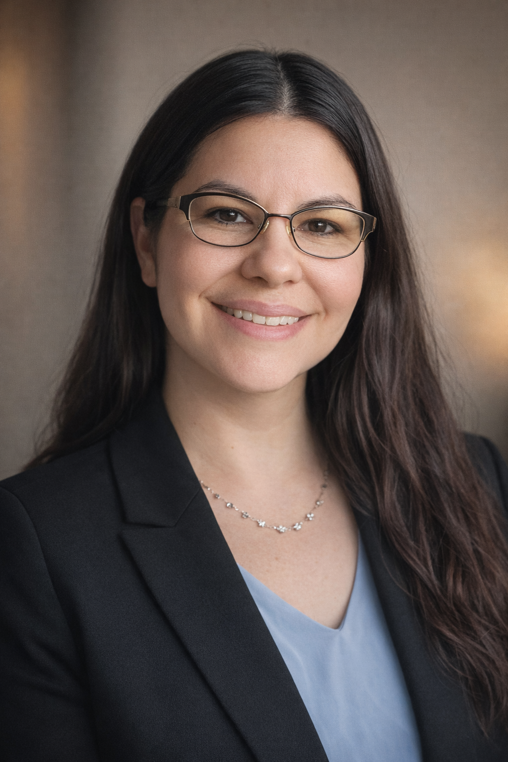 Professional headshot of Ashley Dennis, ISO/IEC 17025 laboratory quality consultant.