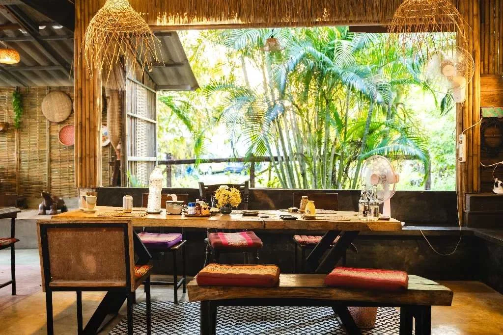 Dining area with garden view at Proud Home Thai Cooking Class, Koh Phangan