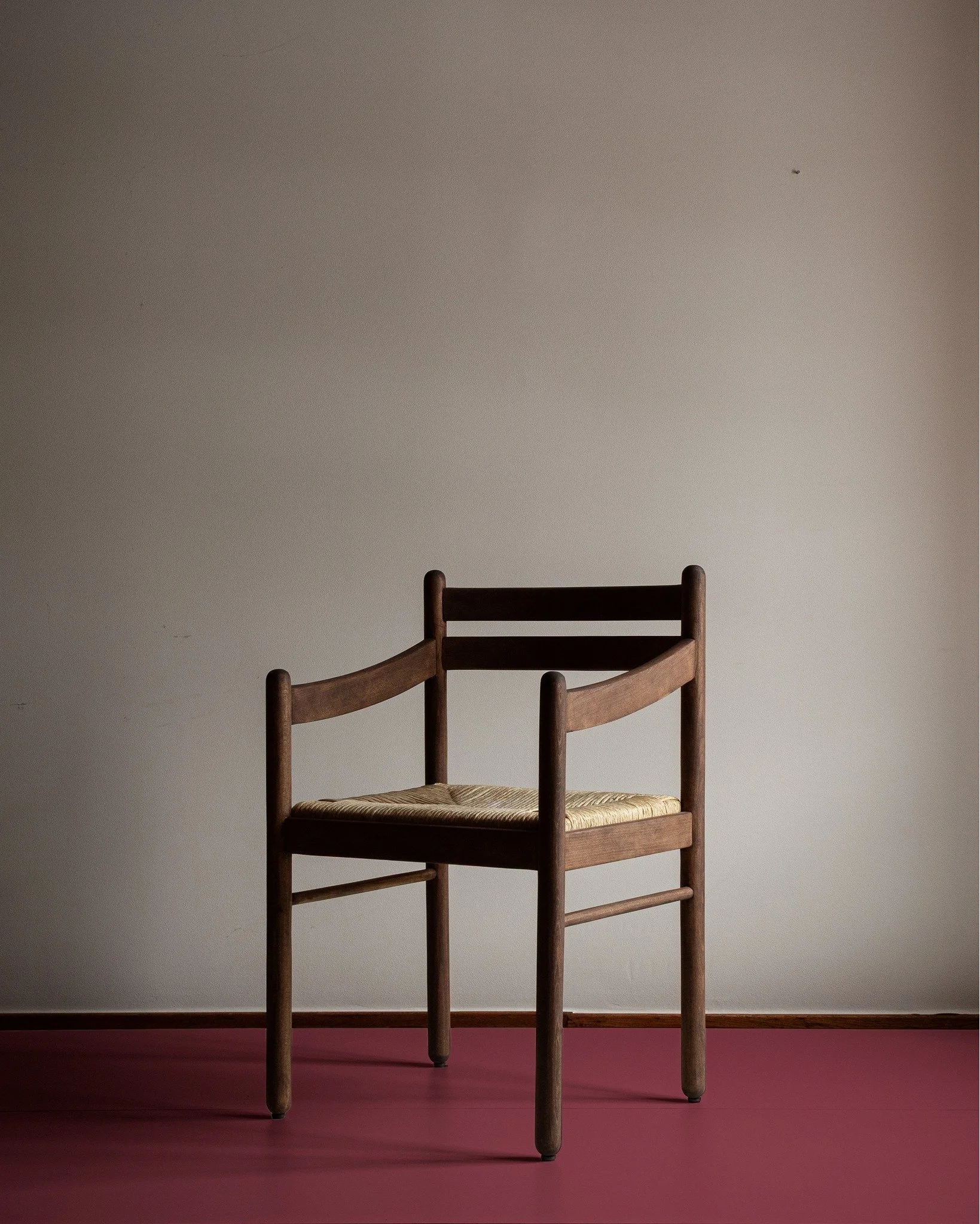 Three wooden chairs with woven seats &mdash; sanded down and treated with tinted dark oil for a warm, natural matte finish.

Price on request