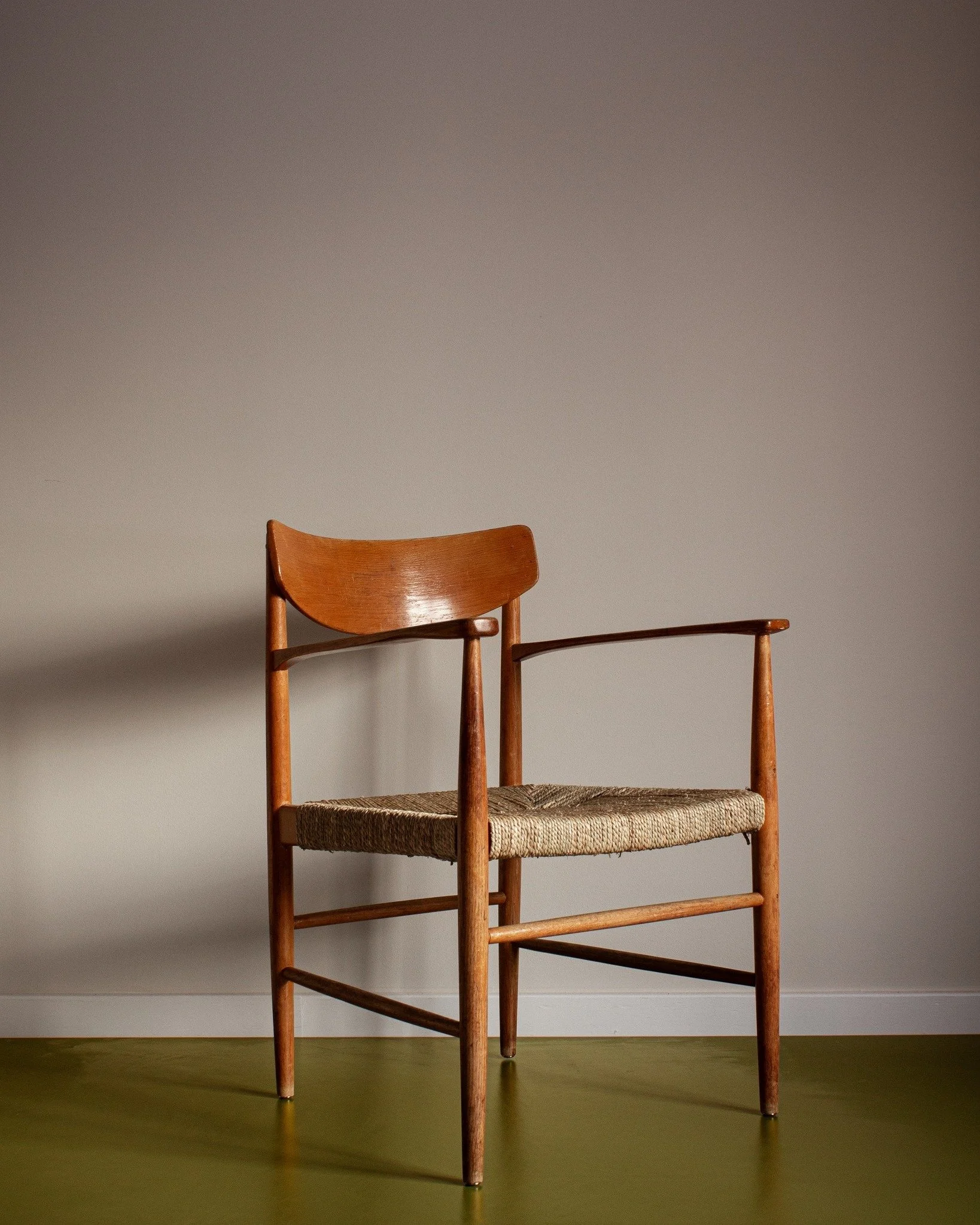 Armchair. From the 1970s. Made of oak. Refurbished with new seagrass seat. 

Price on request