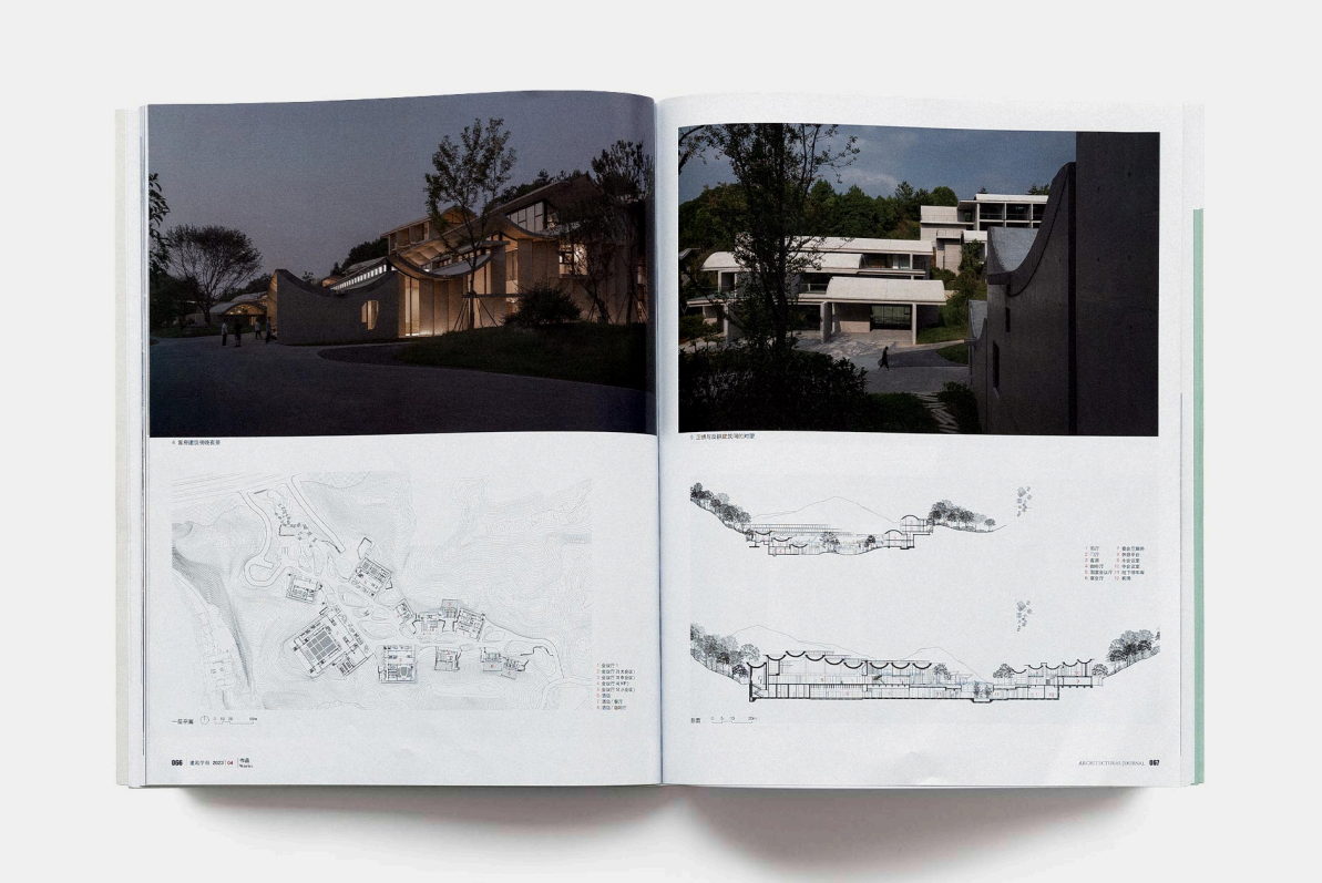 Open magazine featuring architectural buildings, nighttime and daytime photos, detailed floor plans and architectural diagrams of modern structures.