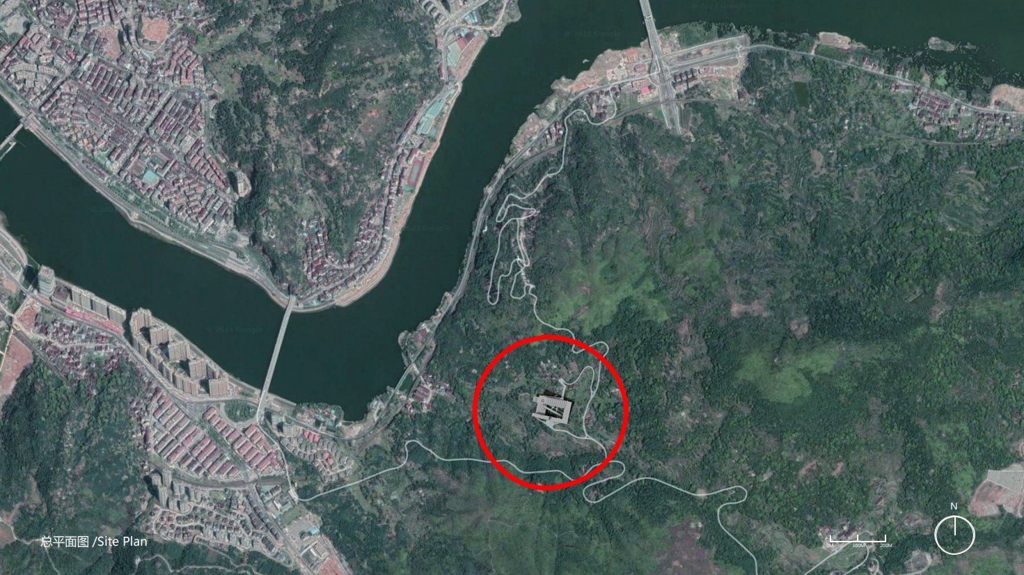 Satellite view of a landscape with a river, residential areas, and wooded hills. A red circle highlights a specific area with a building.