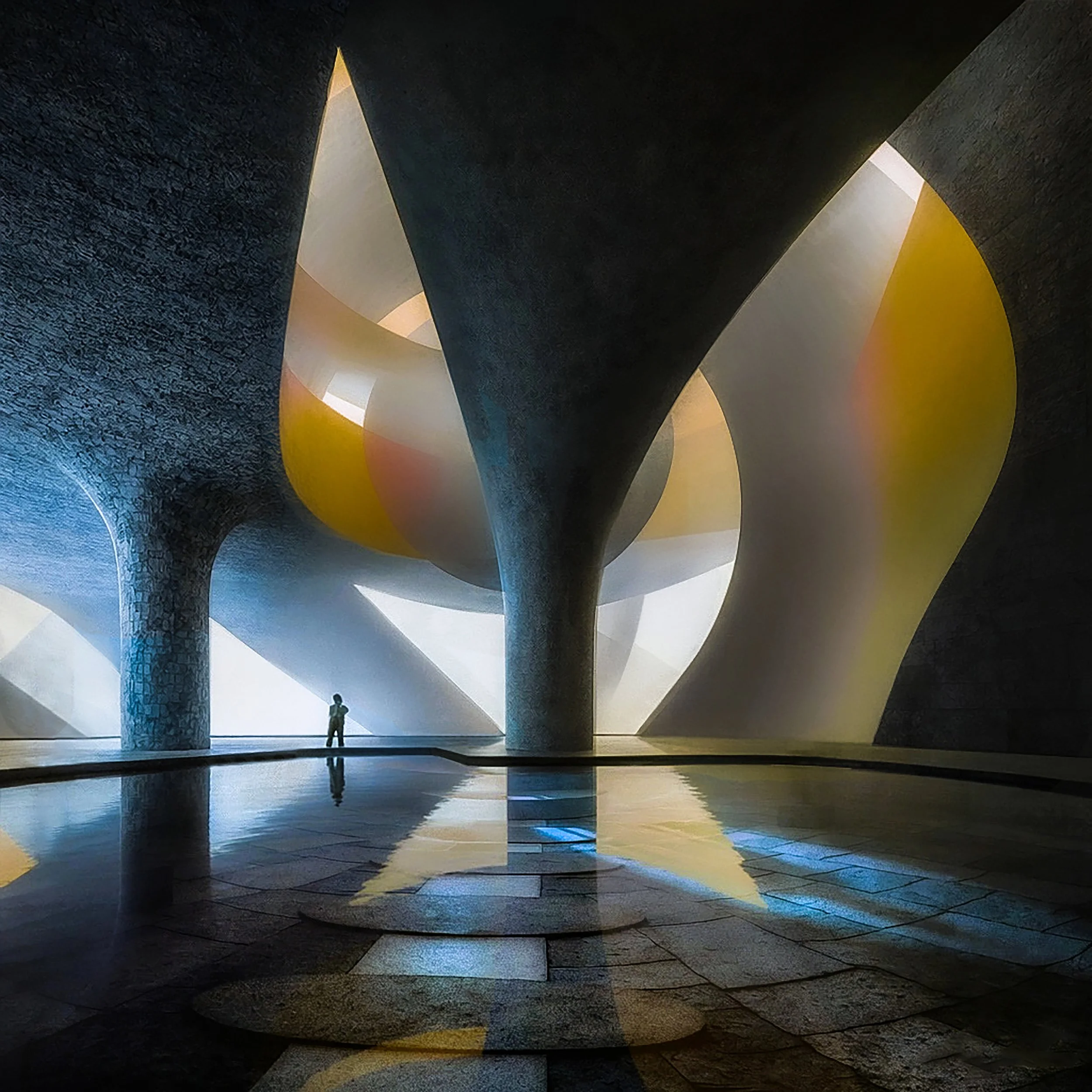 Interior view of a modern architectural structure with curved, textured dark walls and ceiling, illuminated by soft lighting, featuring a person standing in front of a reflective water surface.