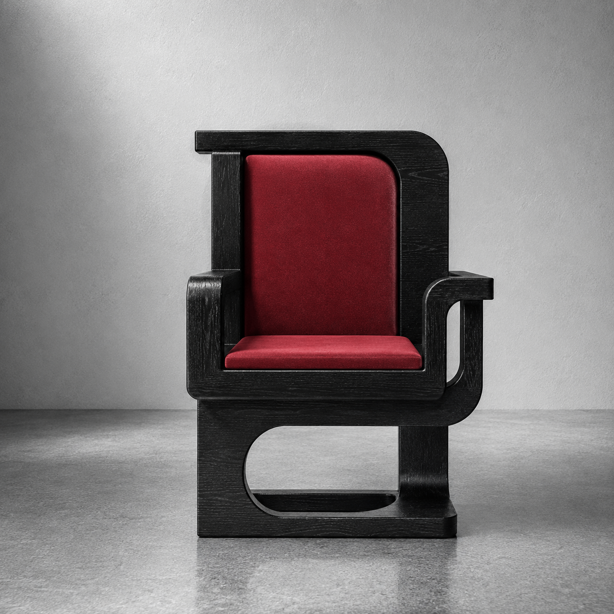 A black wooden chair with a high back and armrests, upholstered with red fabric, positioned against a plain gray wall.