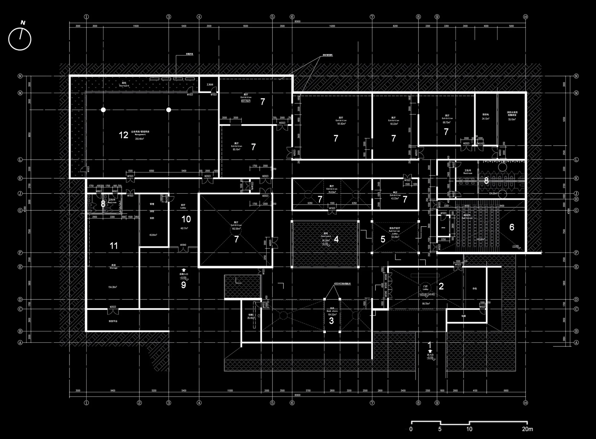 Blueprint floor plan of a building, showing rooms, walls, doors, and measurements. The layout includes spaces labeled for management, exhibitions, storage, restrooms, and courtyards.
