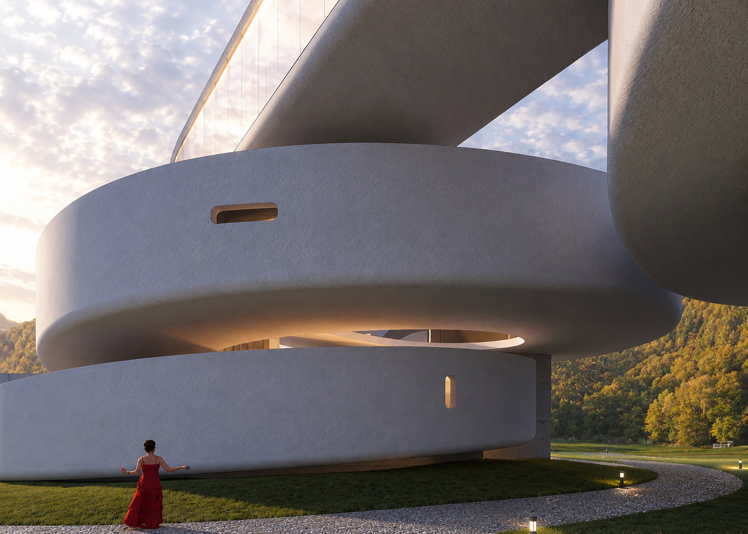 A modern white architectural building with curved shapes and openings, set against a background of a sky with clouds and trees, with a woman in a red dress standing on the grass in front.