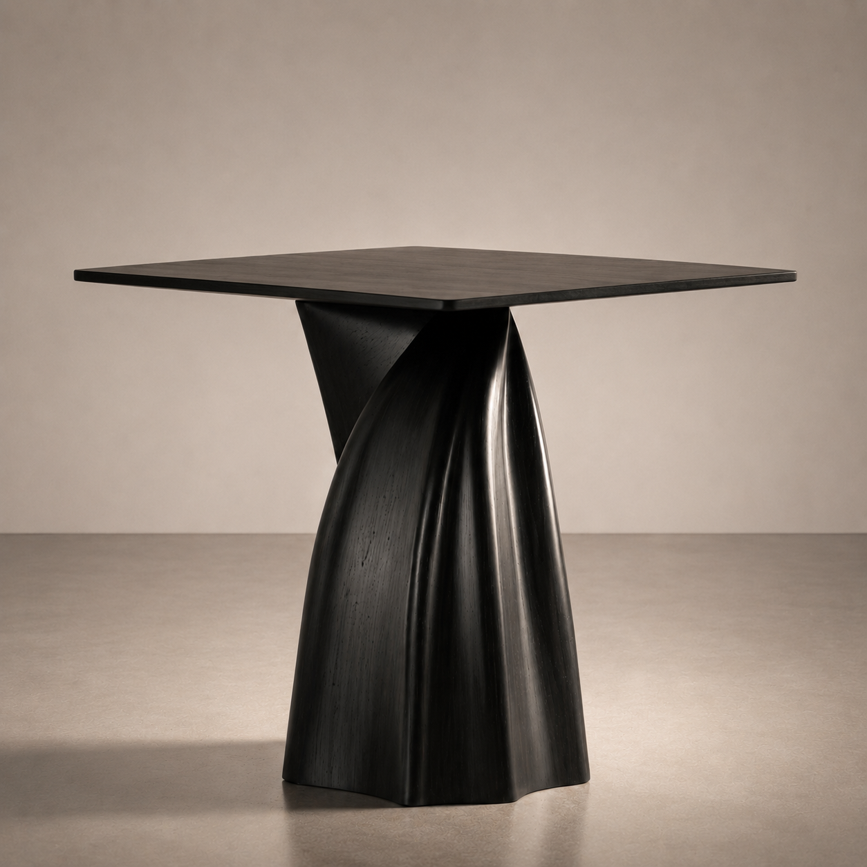 A modern black wooden side table with a sculptural, twisted base and a flat rectangular top against a plain neutral background.