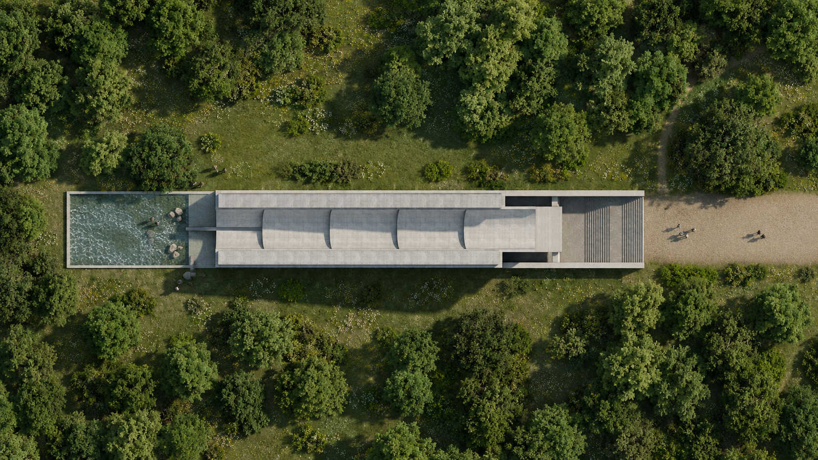 Aerial view of a modern building with a flat roof, surrounded by lush green trees. There is a small rectangular pool with rocks and people swimming, and a gravel pathway with a few people walking.