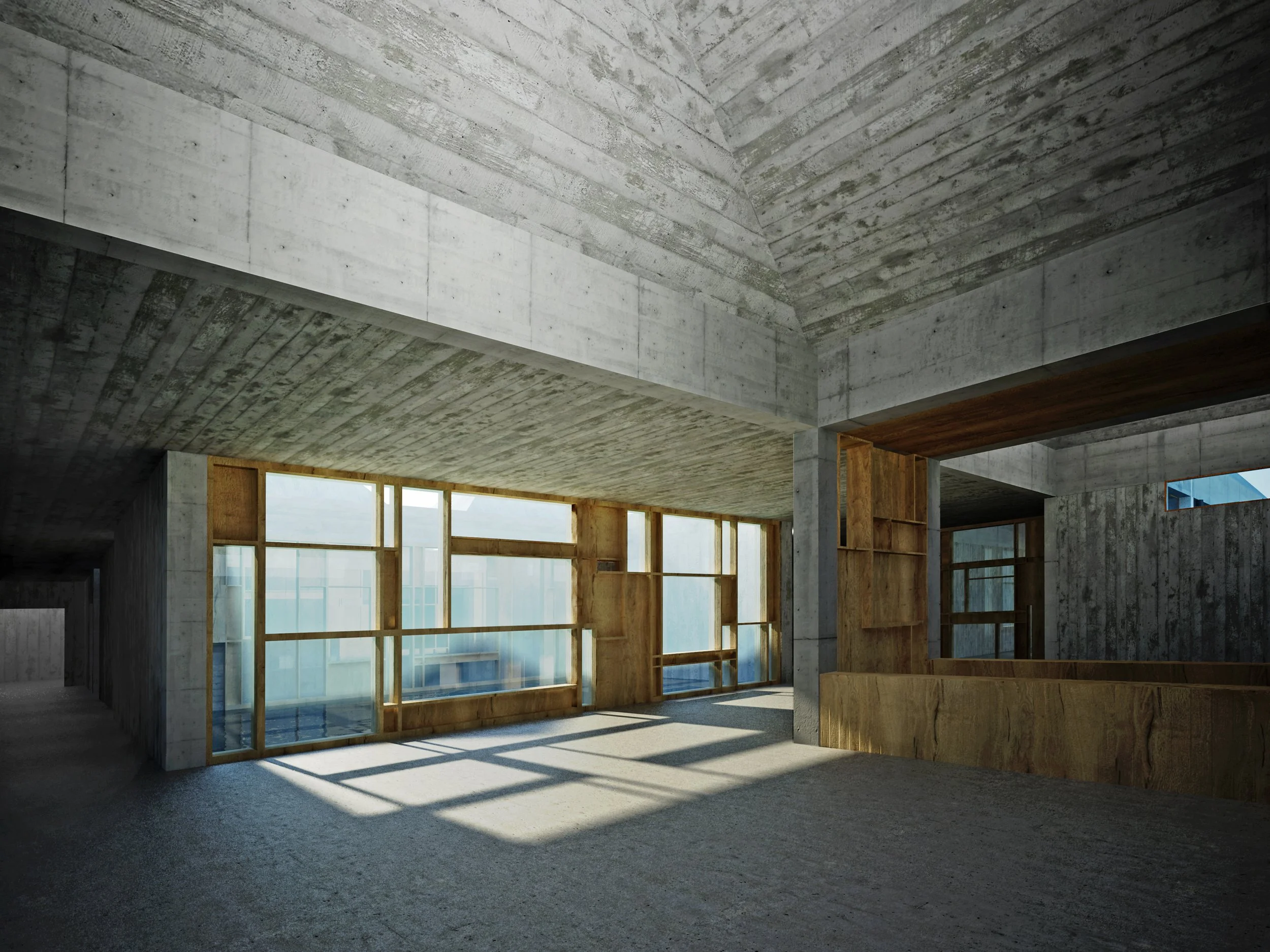 Interior view of a concrete building under construction with large windows allowing natural light and wooden framework.