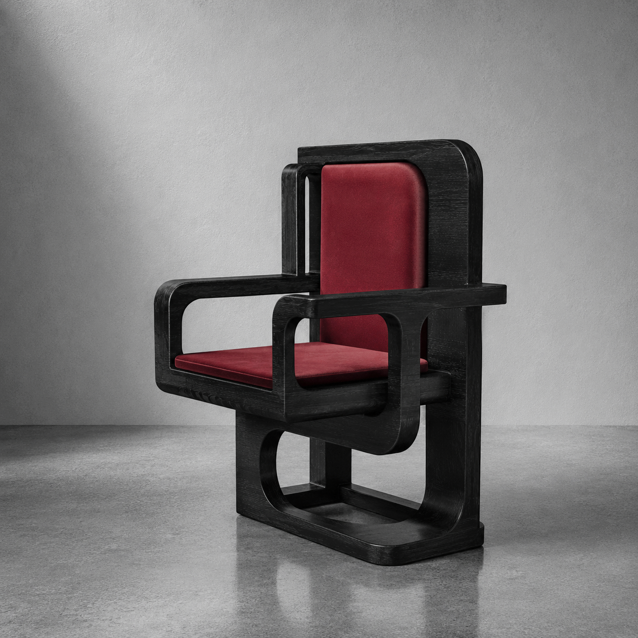 Modern chair with black wooden frame and red leather cushions on the seat and backrest, positioned in a minimalistic gray room.