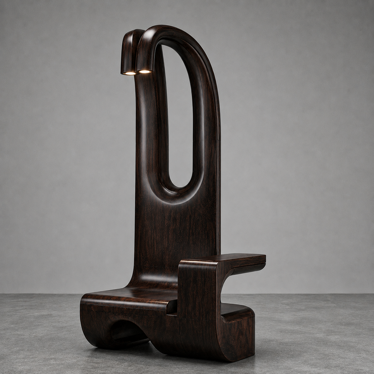 A modern, dark brown wooden accent table with a unique, abstract design featuring a tall, hollow oval shape with two small lights on top, set against a plain gray background.