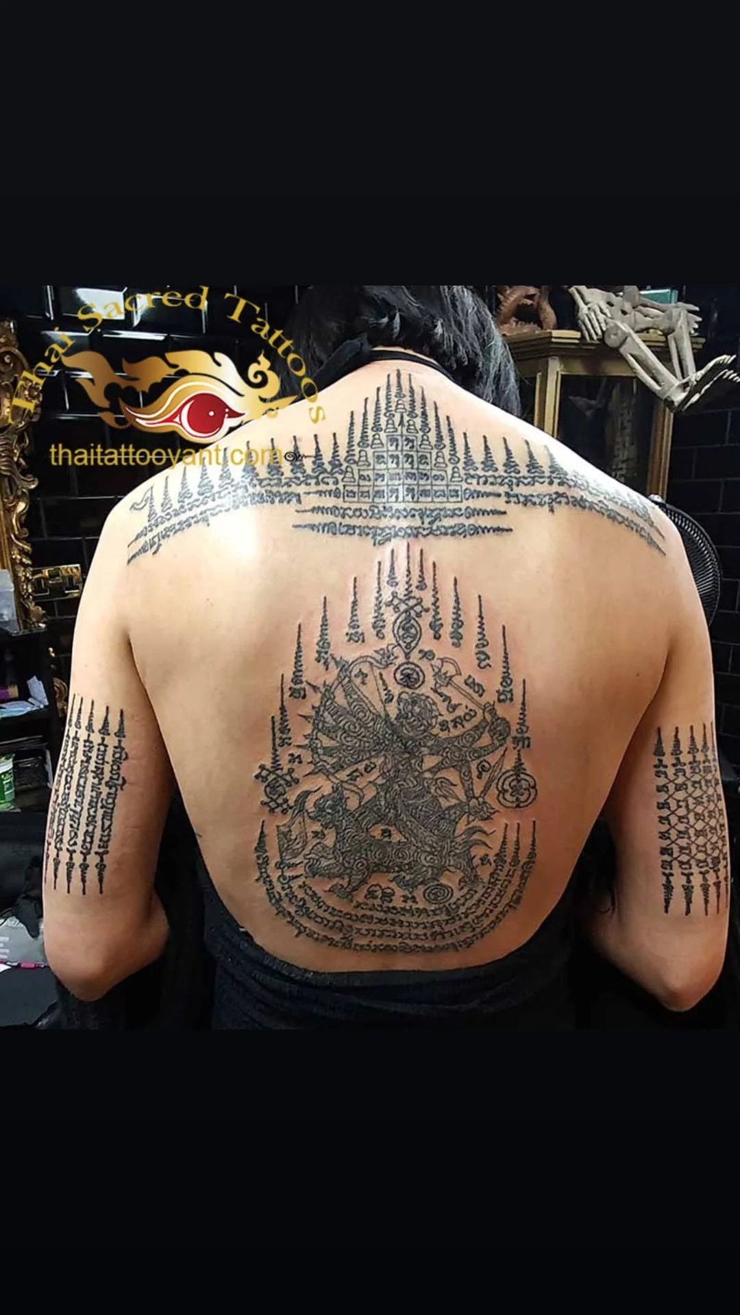 sak yant thai tattoo back and arm chat petch 