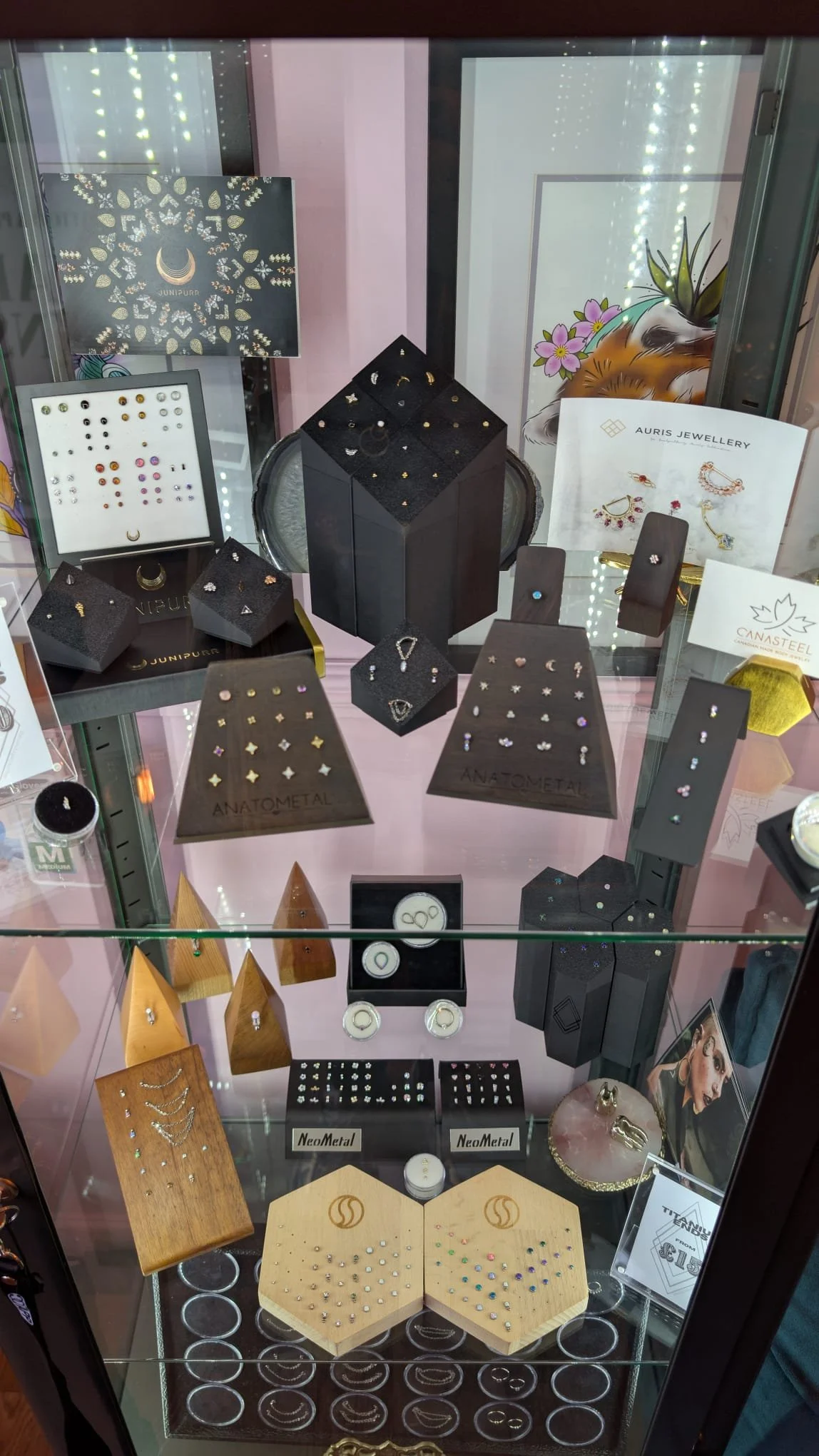 fully stocked piercing jewellery cabinet