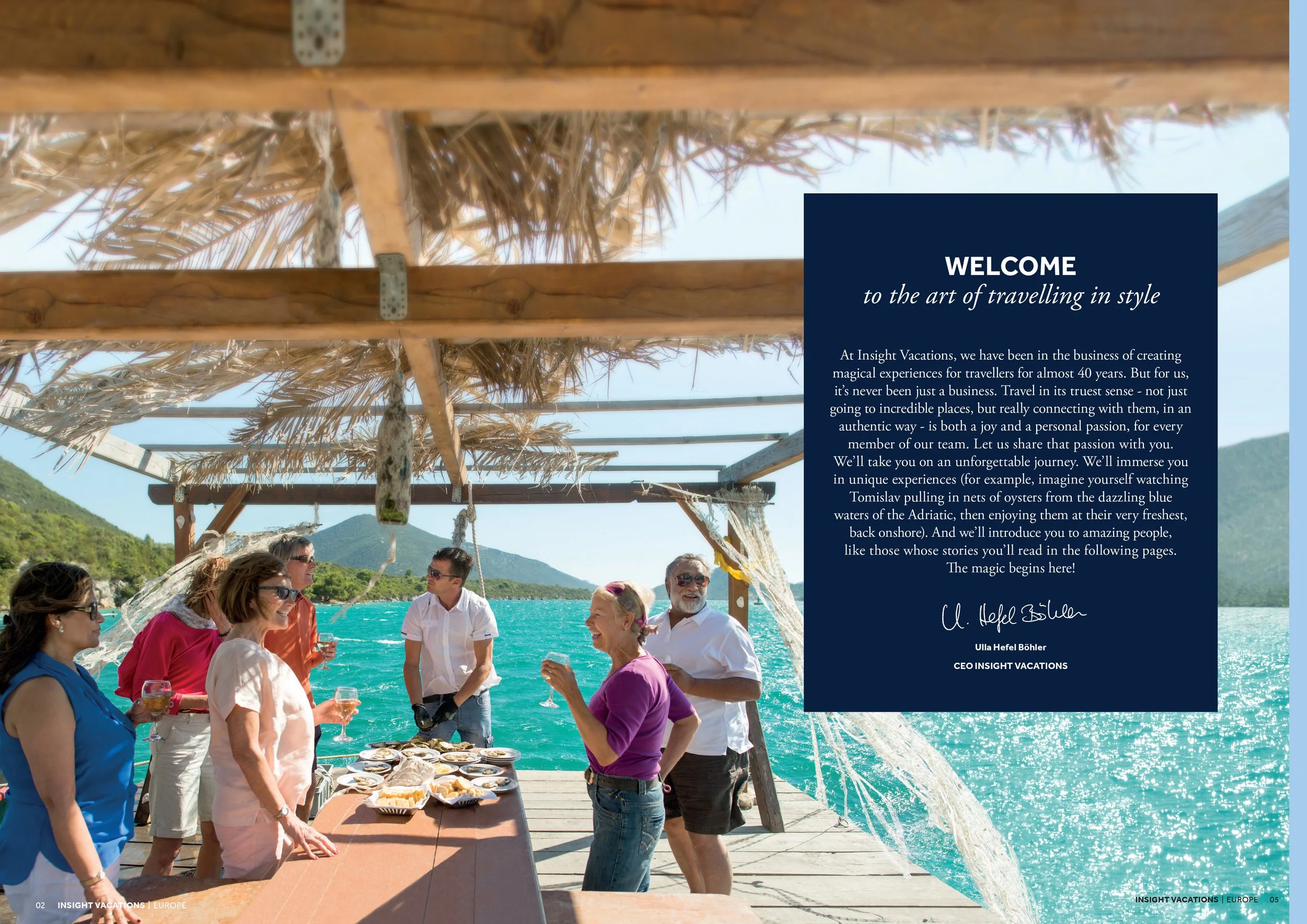 Group of people on a boat under a wooden and thatched roof, with a scenic water and mountain background, enjoying a social gathering with food and drinks.