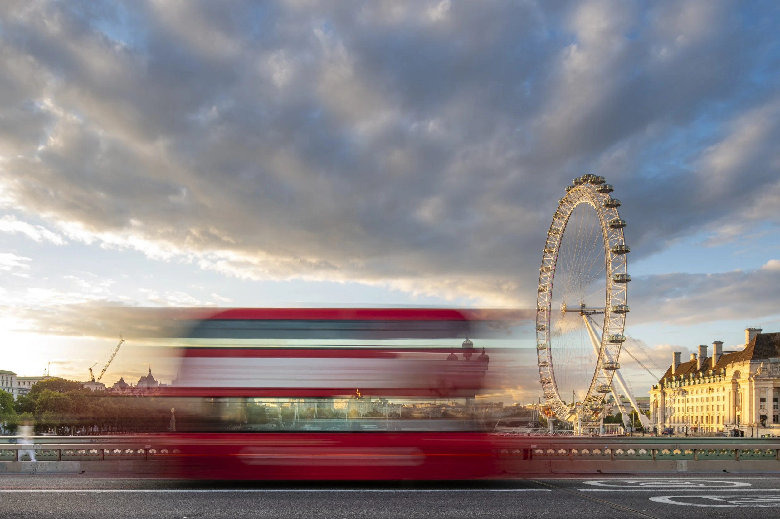 Red London bus and the Millennium Wheel. The Shard of Glass in London Bridge. Architecture, location, travel and destination photography in London photographed by Alex Treadway.  