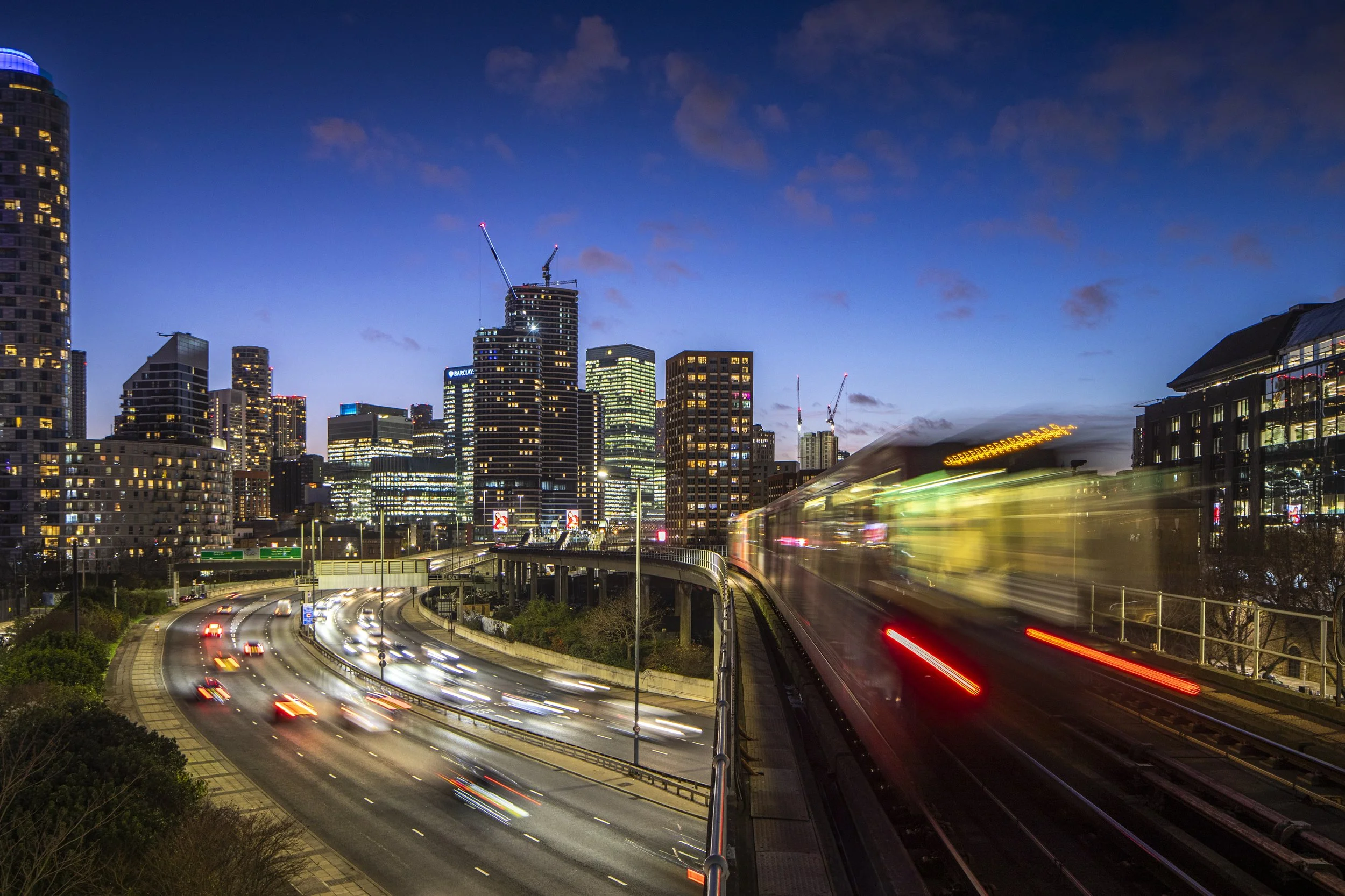 Train in London Docklands. Architecture, location, travel and destination photography in London photographed by Alex Treadway.  