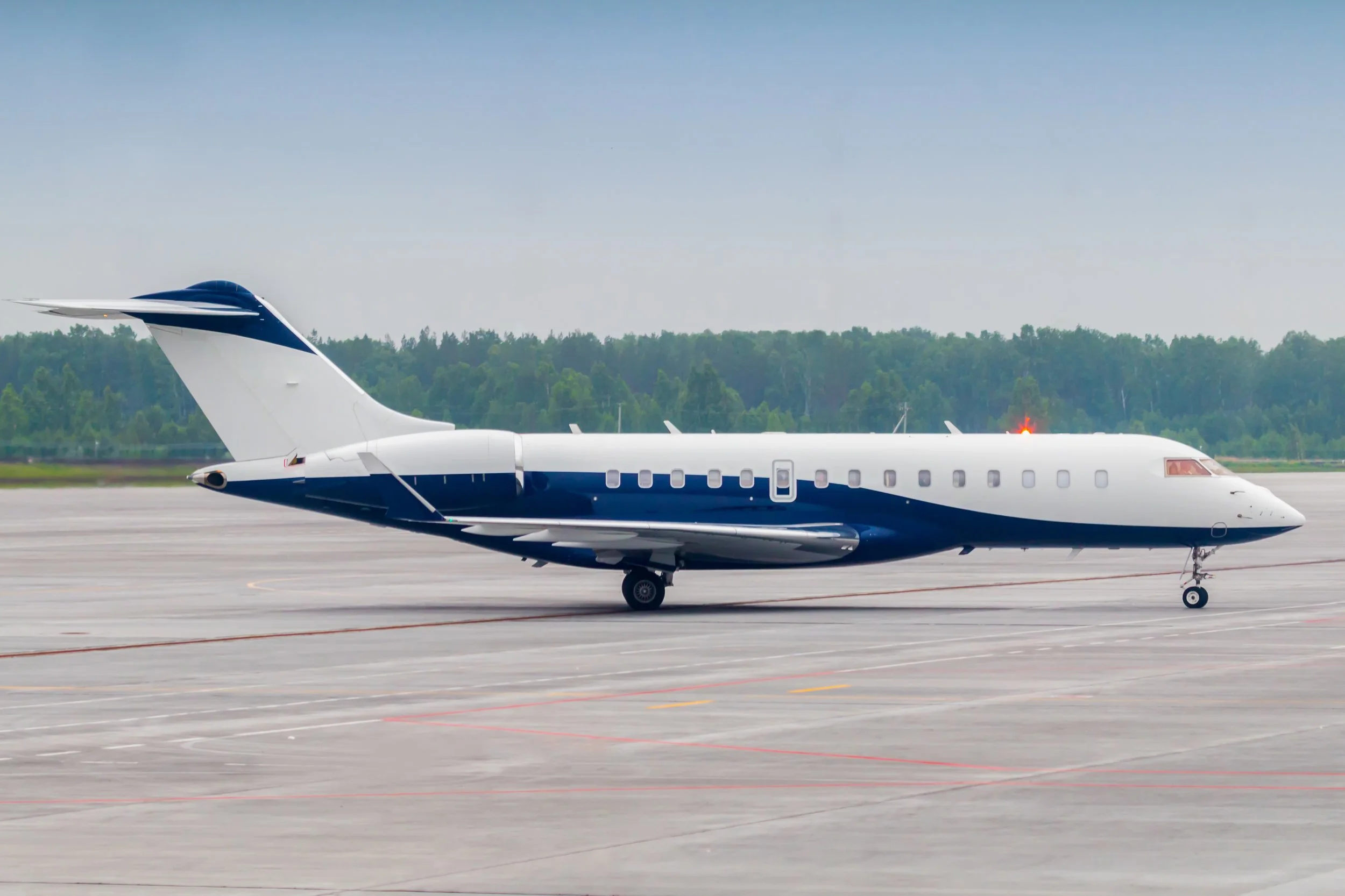 Private jet airplane on airport tarmac