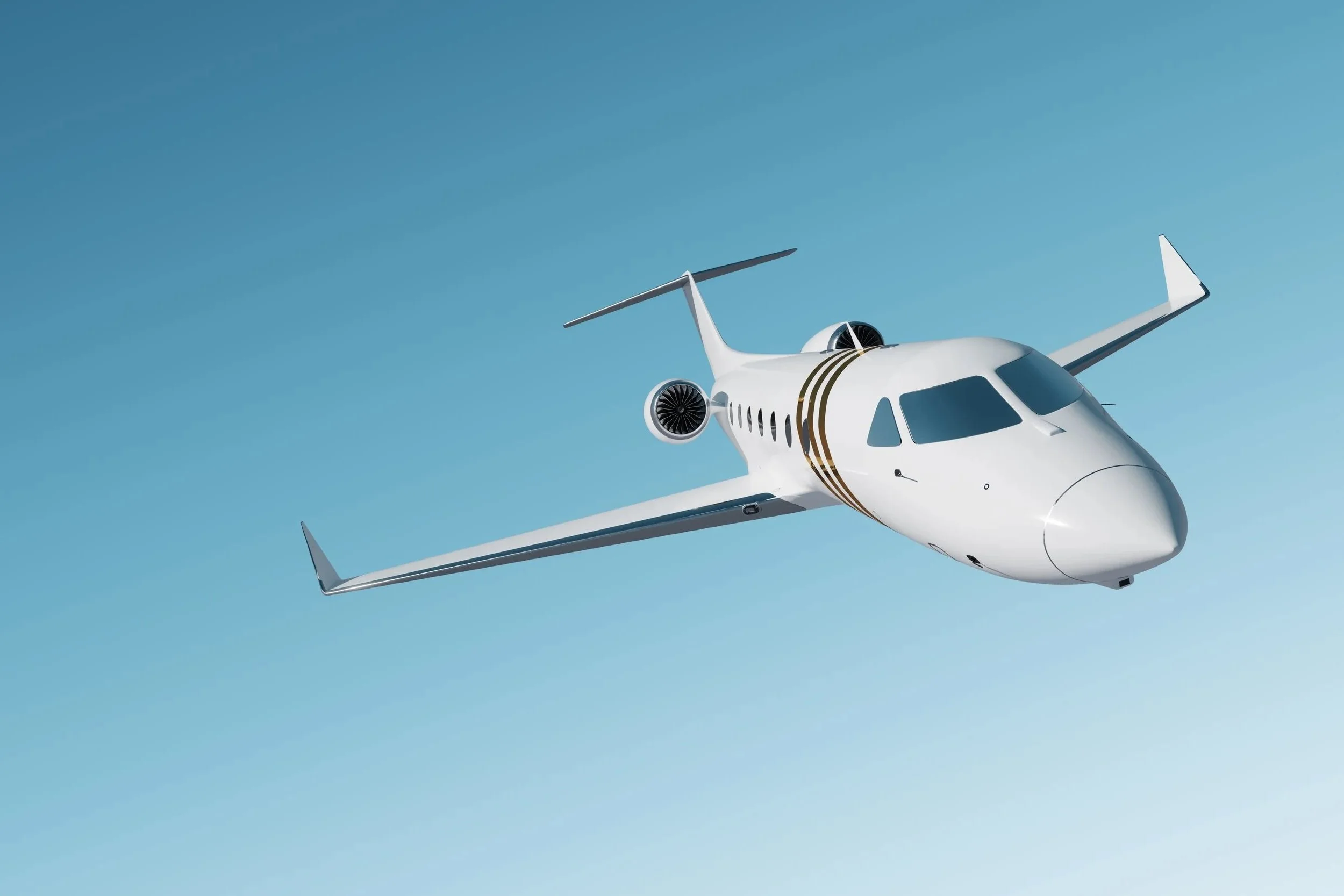A white private jet flying in a clear blue sky.