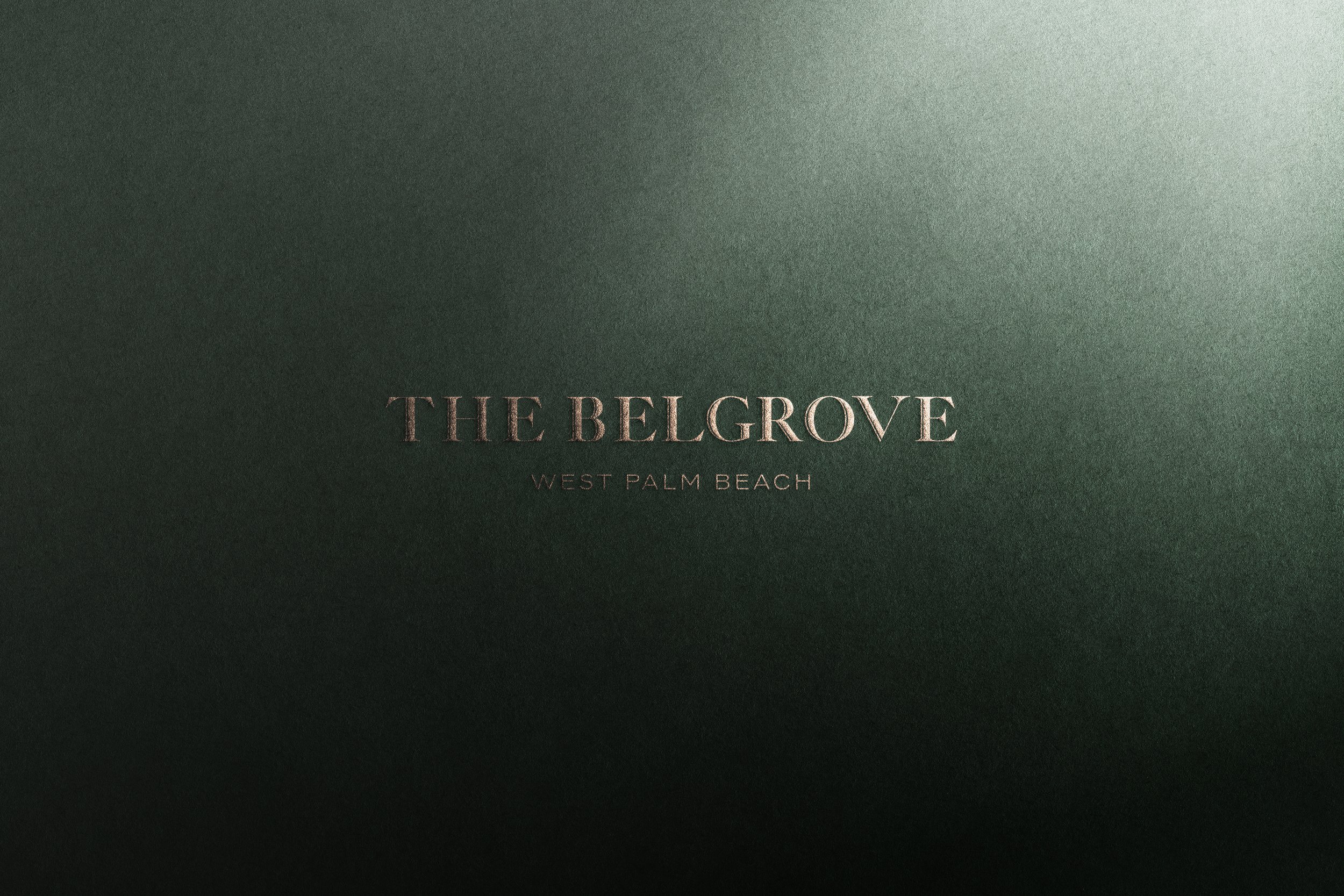 A dark green textured background with centered metallic text that reads 'THE BELGROVE' and smaller text below 'WEST PALM BEACH'.