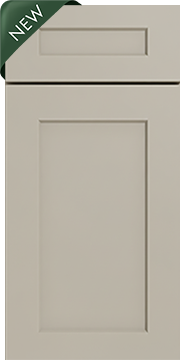 A cream-colored kitchen cabinet door with a rectangular inset panel and a small drawer above it, with a green corner label reading 'NEW'.