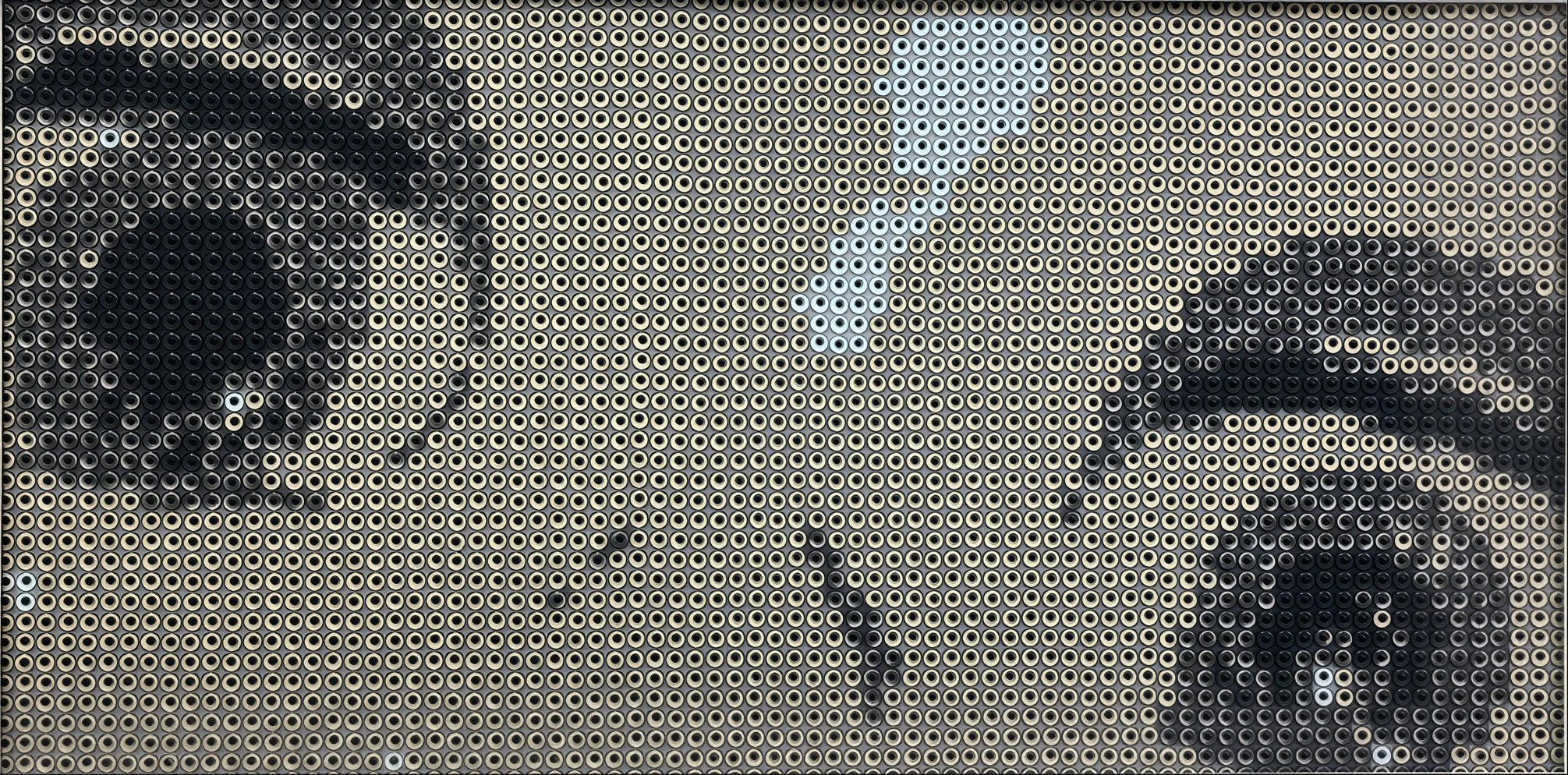 Close-up of two panda faces created with colored pencils or markers, with a panda face in the background and a smaller panda face to the right. The background features a blue heart shape.