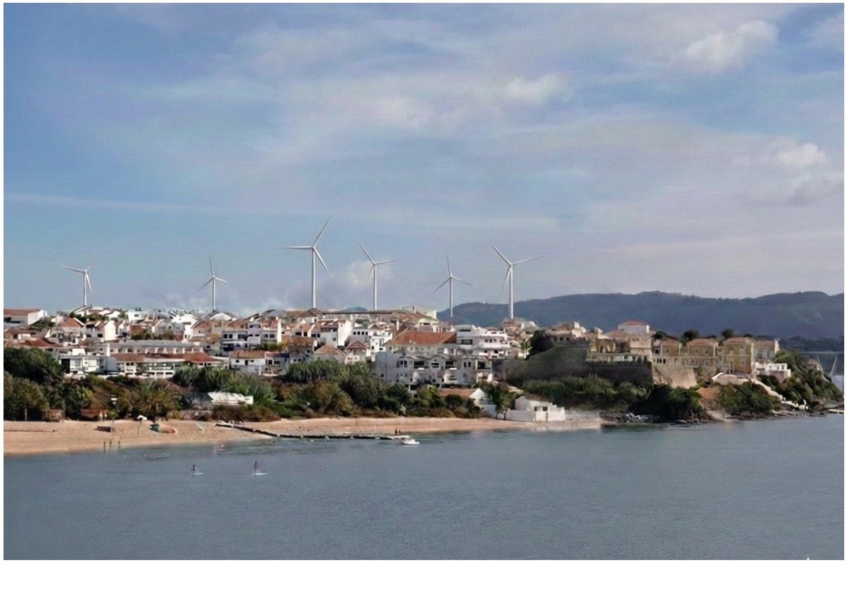 Paisagem com cidade à beira mar, incluindo torres de energia eólicas ao fundo, casas e vegetação ao longo da costa.