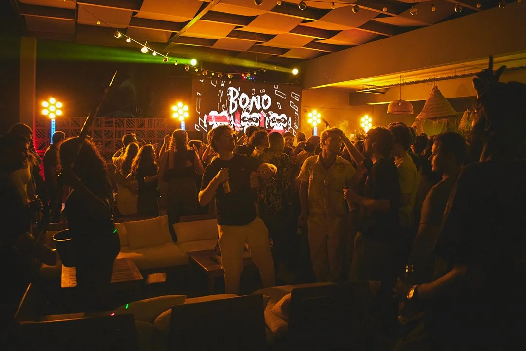 A group of people dancing at a party