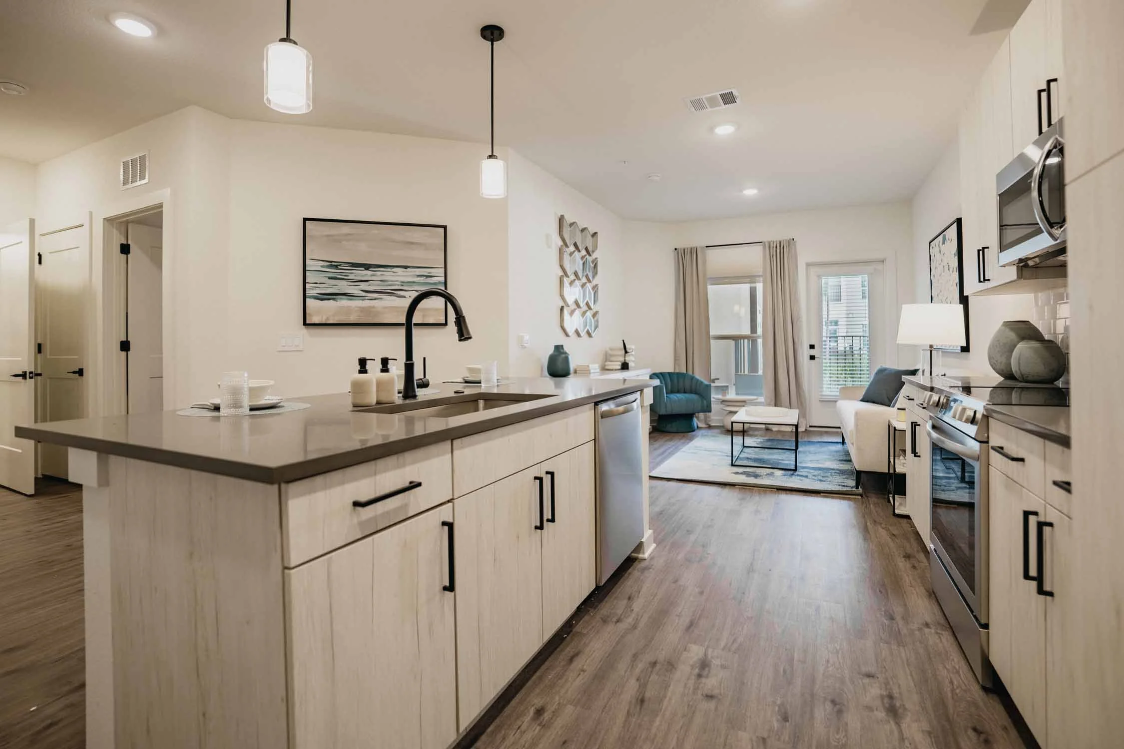 Aspire on 10th | Luxury Apartments in Sarasota, FL | Kitchen and Living Room