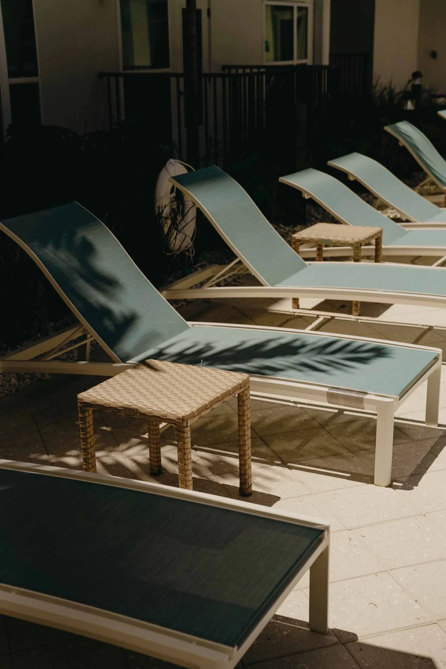 Aspire on 10th | Luxury Apartments in Sarasota, FL | Chair at Pool