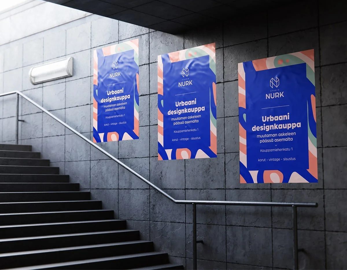 Graafisen suunnittelun työnäyte julisteista kaupunkiympäristössä
