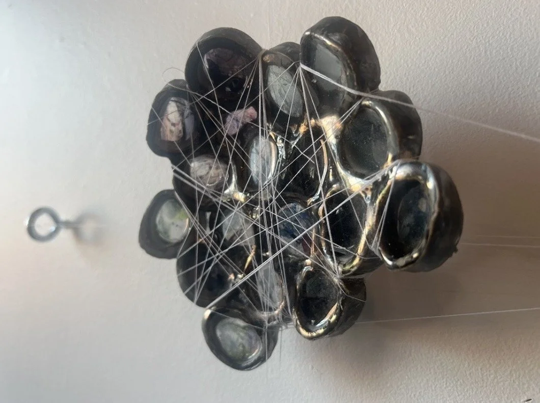 Memory Cells, 2024
Ceramic, thread, resin, photographic transparencies