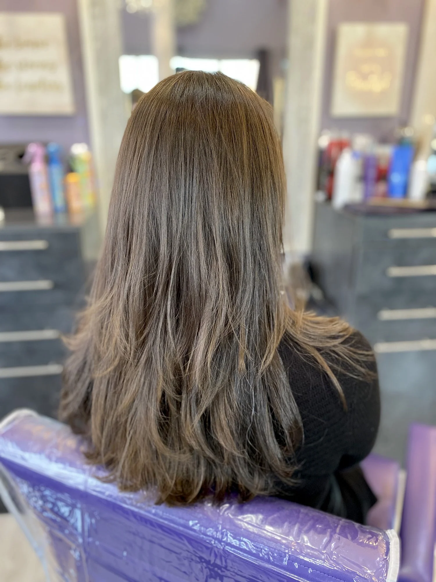 Long brunette hairstyle.