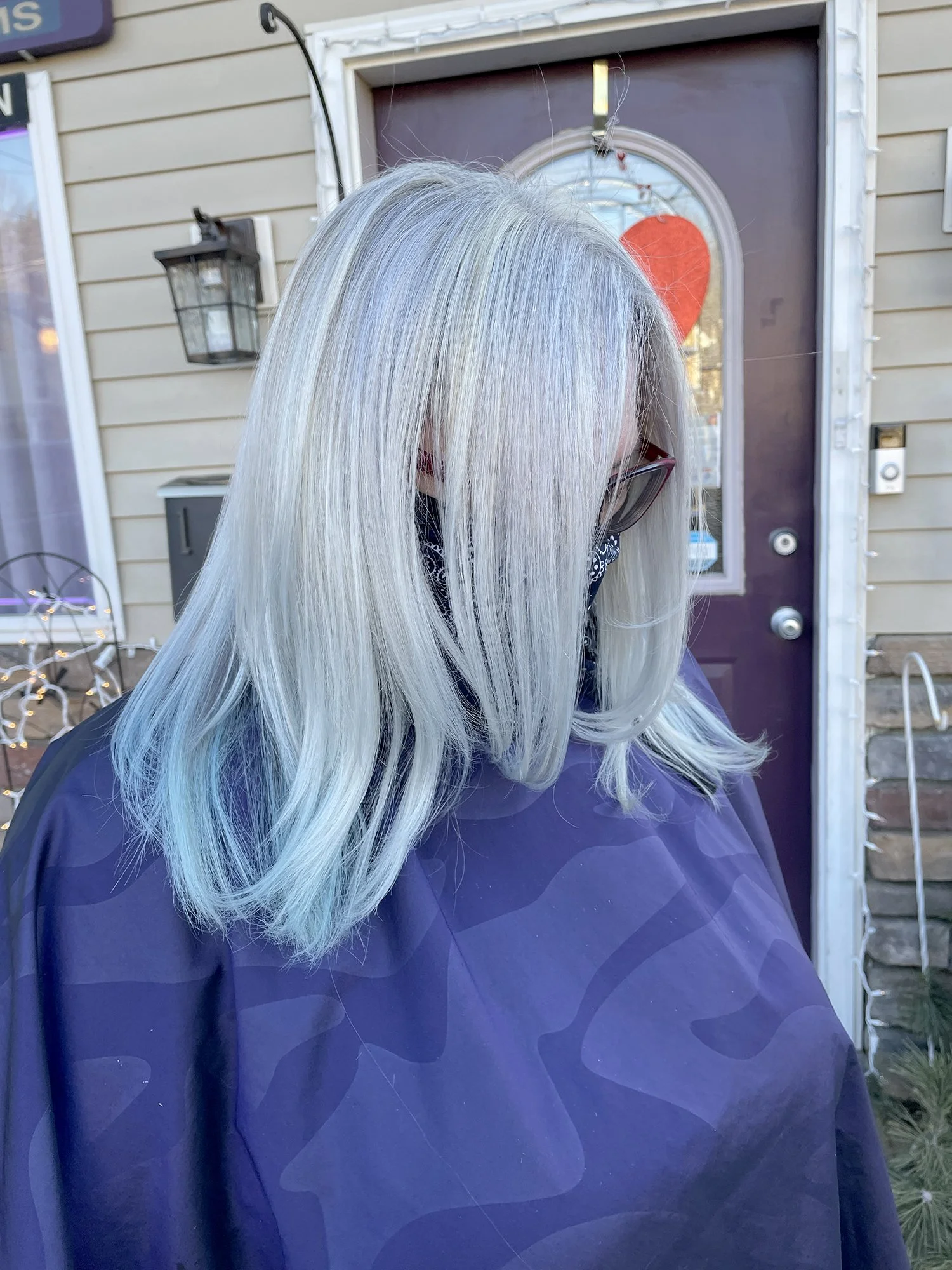 Silver hairstyle with blowout.