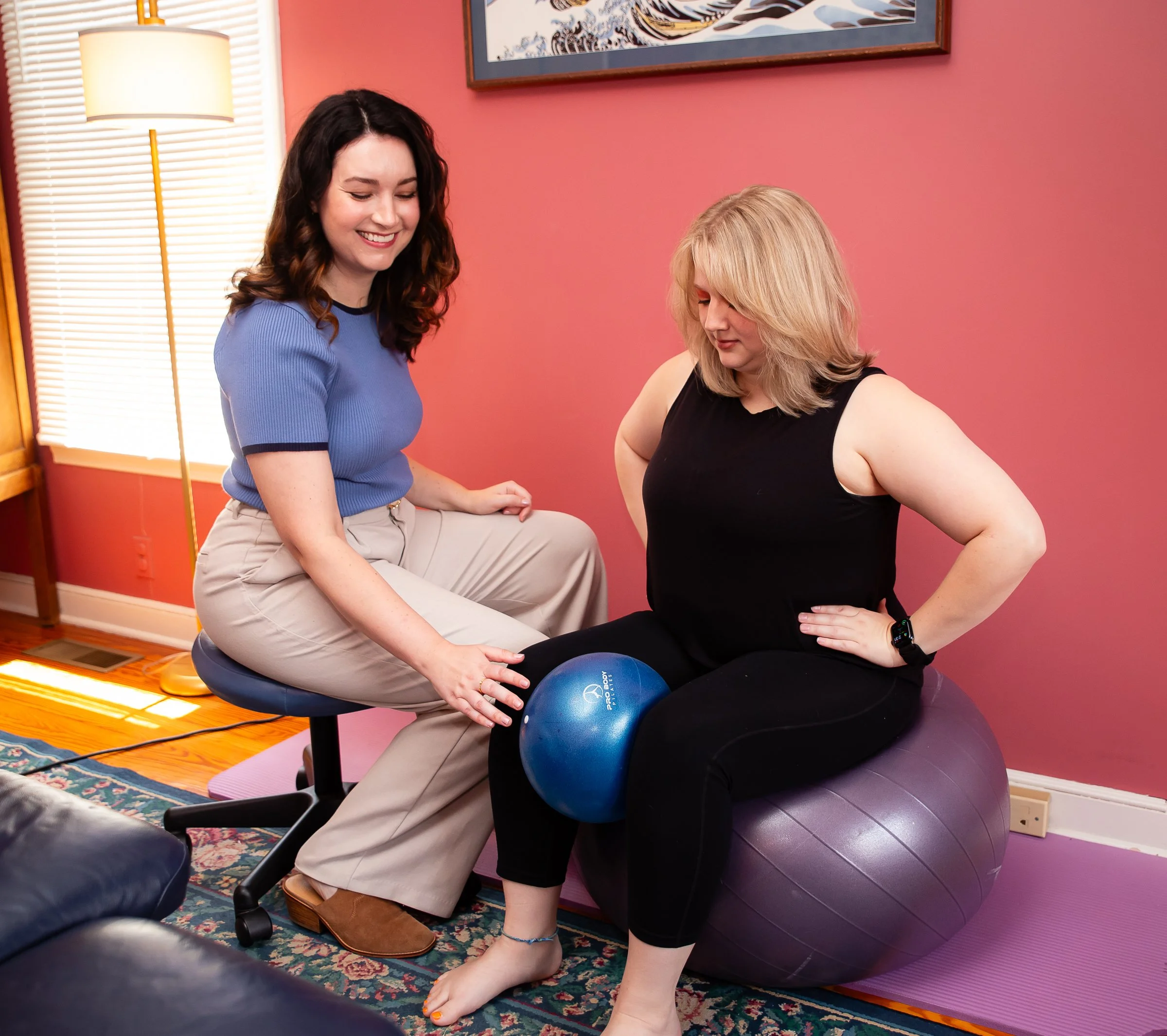 Pelvic floor physical therapist treats client in office
